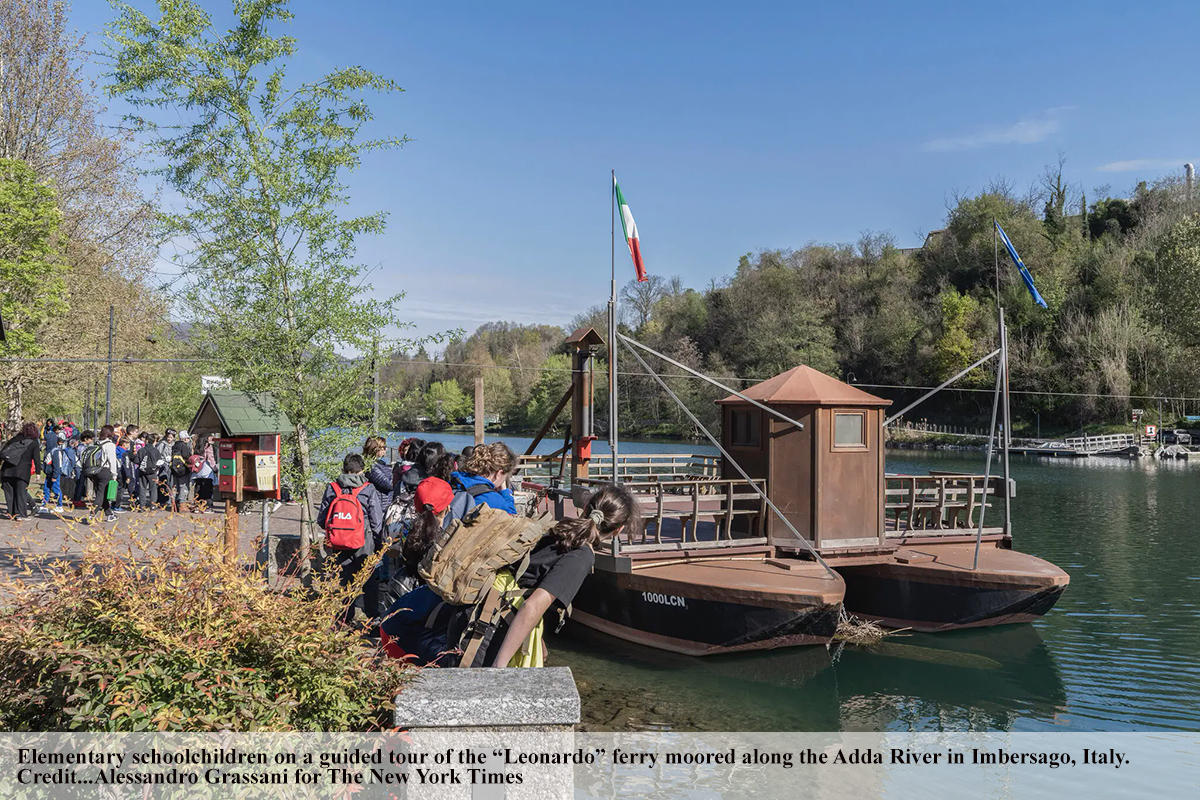 Elementary schoolchildren on a guided tour of the “Leonardo” ferry moored along the Adda River in Imbersago, Italy.Credit...Alessandro Grassani for The New York Times
